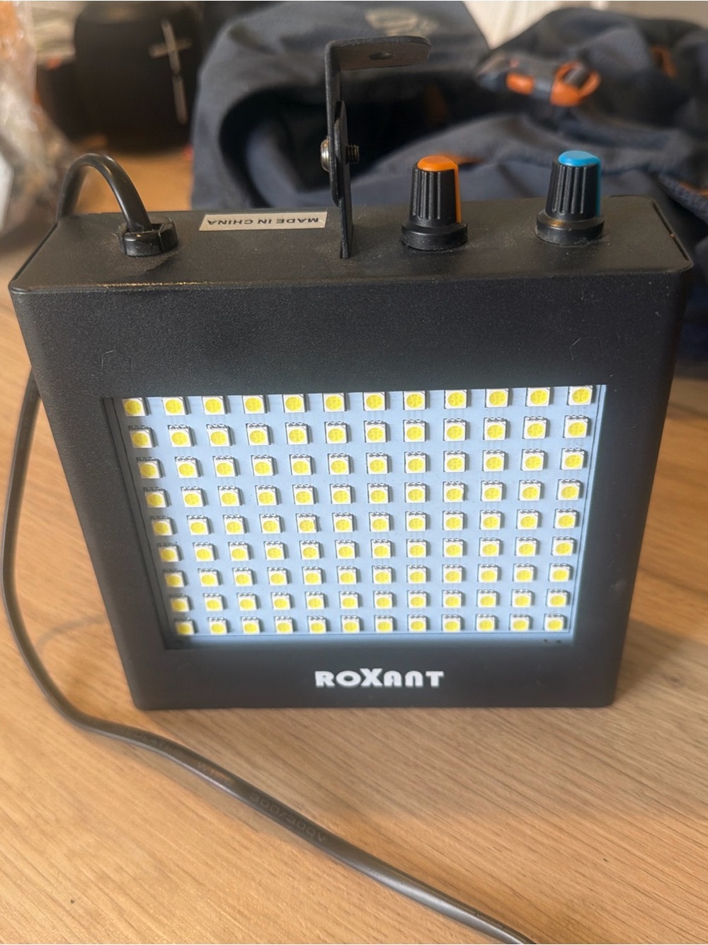 Black LED strobe Light with Adjustable Controls to increase the speed.